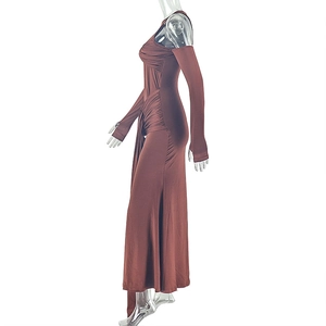 Detail of ruched side seams and high-stretch fabric on the brown bodycon maxi dress