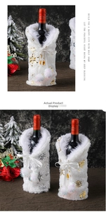 Detail of plush Christmas wine bottle cover with gold silver snowflake and faux fur collar