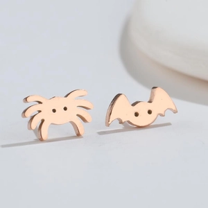 Asymmetric gothic rose gold bat and spider stud earrings in polished stainless steel