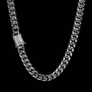 Detailed close-up of 12mm silver Cuban link chain with a diamond-encrusted box clasp closure