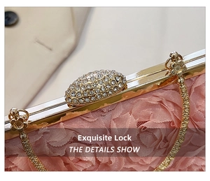 Close-up of pink lace flower clutch featuring a diamond clasp and gold metal chain