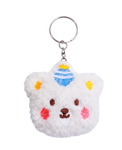 Close-up of fluffy white panda plush keychain with colorful embroidery details