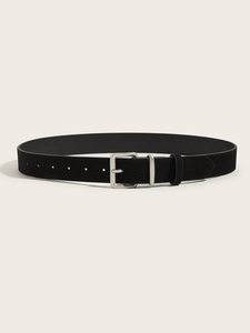 Detail of vintage wide black suede waist belt with matte silver pin buckle closure