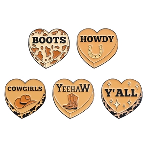 Five-piece set of heart-shaped enamel pins with Western cowboy theme and cowhide patterns