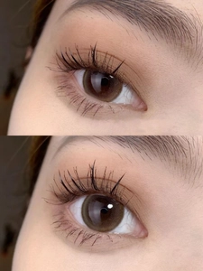 Detailed close-up showing matte brown liquid eyeshadow and mascara on clear eye makeup