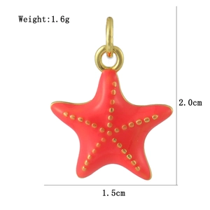 Macro view of a red starfish pendant with 18k gold plating and size measurements