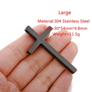 Detailed view of a black 304 stainless steel cross pendant showing precise dimensions