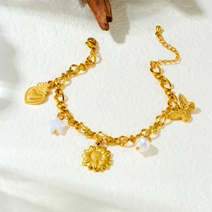 Gold plated stainless steel bracelet with shell charms including sun flower and heart