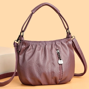 Elegant purple textured leather pleated handbag with adjustable shoulder strap and zip pocket