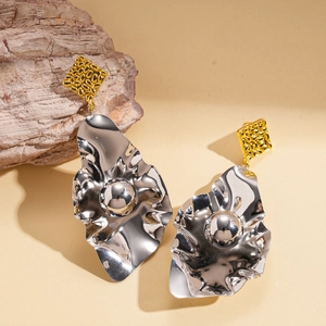 Abstract irregular leaf geometric earrings in two-tone gold and silver hammered metal