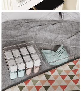 Detailed view of stackable clear organizer boxes for socks, underwear and bras