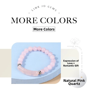 Detailed shot of a natural rose quartz beaded bracelet on a blue geometric display stand