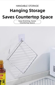 Detail of silver metal storage rack showing hangable design with clear adhesive hooks