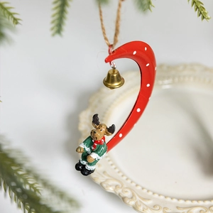 Christmas hanging ornament featuring a red candy cane, small bell, and cute reindeer doll