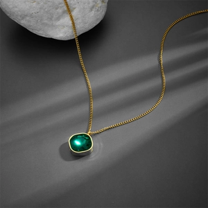 Gold titanium steel necklace featuring a square green zircon pendant with sunlit shadow