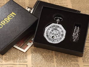 Silver hollow mechanical pocket watch with Roman numerals in a black gift box