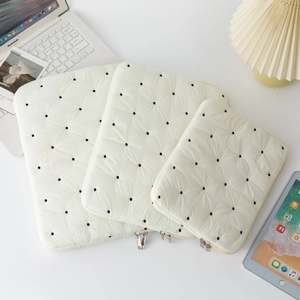 Minimalist cream-colored quilted polka dot laptop sleeve and tablet pouch set