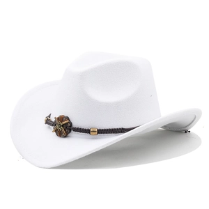 Detail of white cowboy hat with ethnic braided band and floral wooden ornament