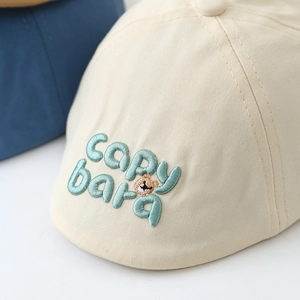 Beige cotton kids beret hat with Capy bara embroidery for outdoor sun protection