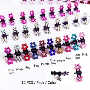 Mini pinces à cheveux fleurs avec strass en dix couleurs pour enfants en présentation matrix