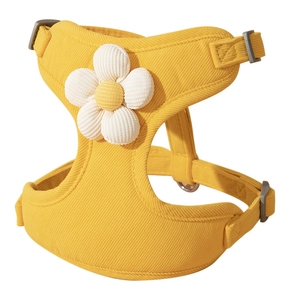 Bright yellow corduroy pet harness with daisy flower applique and adjustable straps