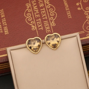 Maillard style heart-shaped stud earrings in gold and dark brown leopard print