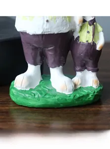 Detail of stable flat base and resin texture on the vintage rabbit figurine ornament