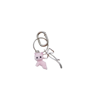 Pink flocked cat and silver bow bead keychain pendant for girls on white background