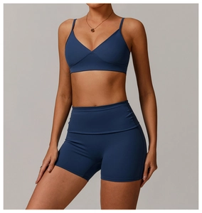 Detail of navy blue high-waist fitness shorts with butt-lifting and tummy control effect