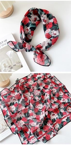 Macro detail of floral linen-cotton square scarf with red flowers and fine black hem
