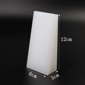 Detailed view of white acrylic jewelry stand with 12x6x3cm dimension markings