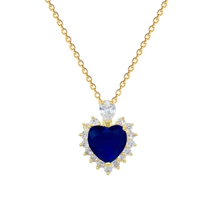 Luxurious gold necklace with heart blue sapphire pendant and cubic zirconia halo