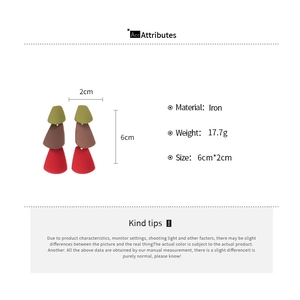 Detail showing geometric triangle tassel earrings size dimensions and iron material specs