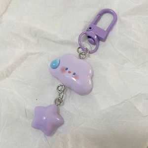 Detail of a purple cloud and star keychain with a matching metal lobster clasp