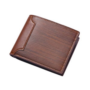 Close-up of brown men's wallet with professional twill texture and neat stitching