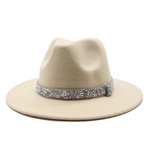 Detail of beige wool fedora hat featuring a sparkling silver rhinestone band decoration