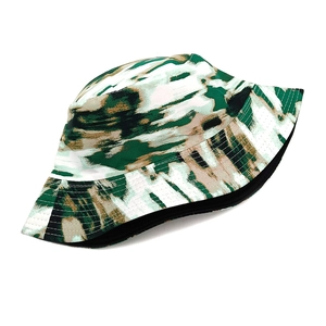 Detail of a tie-dye bucket hat with reinforced wide brim stitching and black lining