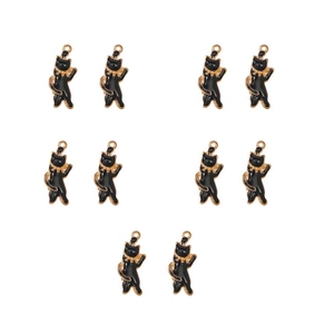Flat lay of 10 black enamel cat charms with gold alloy edges for DIY jewelry making