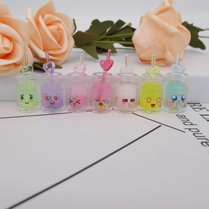 Luminous cartoon expression bottle keychains with heart straws for gifts, 7-piece set
