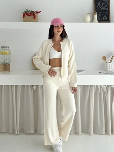 Women's 2-piece knit set featuring zipper cardigan and high-waist wide-leg pants in cream
