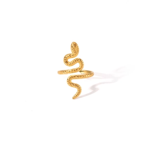 Macro detail of gold-plated snake ring showing realistic scale texture and metallic shine