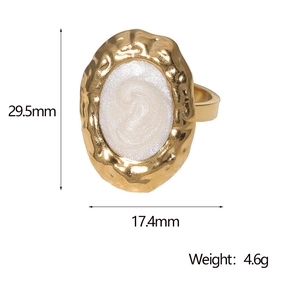 Detail view of gold vintage ring with white oval inlay and size dimensions 29.5mm x 17.4mm