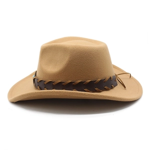 Close-up of a khaki western cowboy hat featuring a leather band with X-pattern weaving