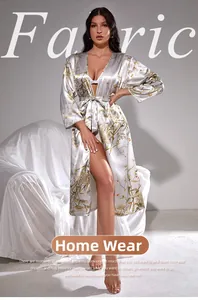 Detail of elegant white satin floral print robe featuring a silky waist tie closure