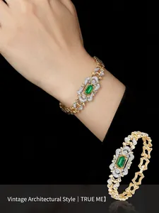 Vintage French style gold emerald bracelet with geometric hollow pattern and pavé zircons