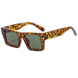 Chic square tortoise shell sunglasses with dark green lenses in a vintage minimalist style