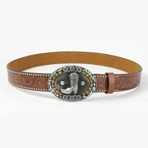 Detail of western cowboy leather belt featuring cowboy boot buckle and turquoise beads