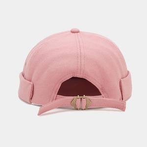 Pink canvas docker hat with PARIS embroidery and adjustable brass metal buckle back view