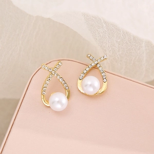 Elegant French style gold crossed earrings with pearls and crystal rhinestones