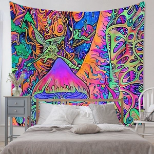 Close-up detail of bohemian mushroom tapestry with psychedelic colors in a bedroom setting